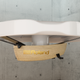 A close-up of one of the Roland's 50th Anniversary Concept Piano's speaker drones, against a concrete wall.